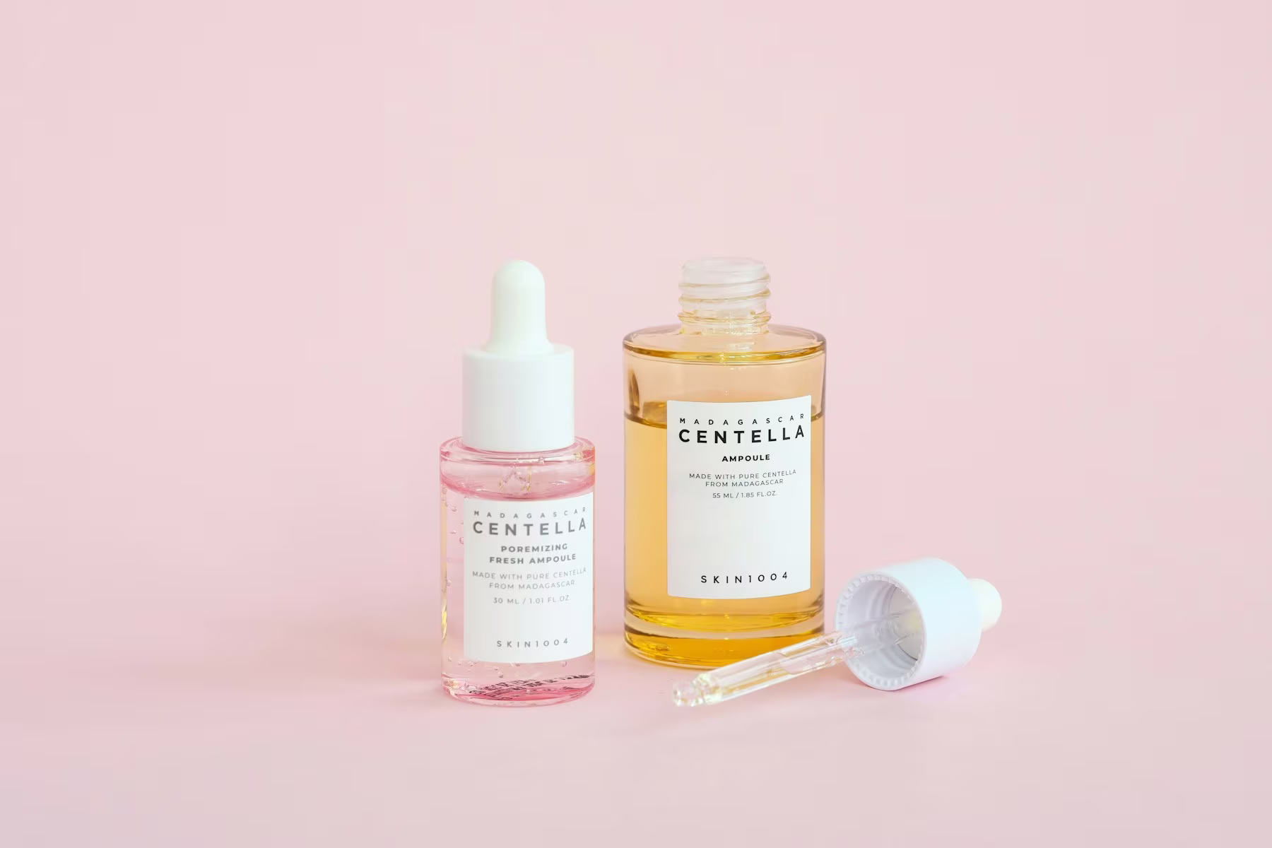 Connected wellness products arranged on a pale rose background